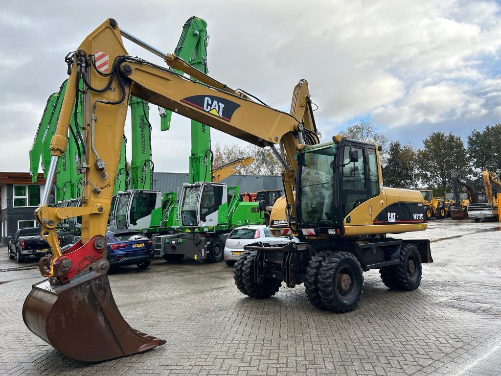 колесный экскаватор CATERPILLAR M318C