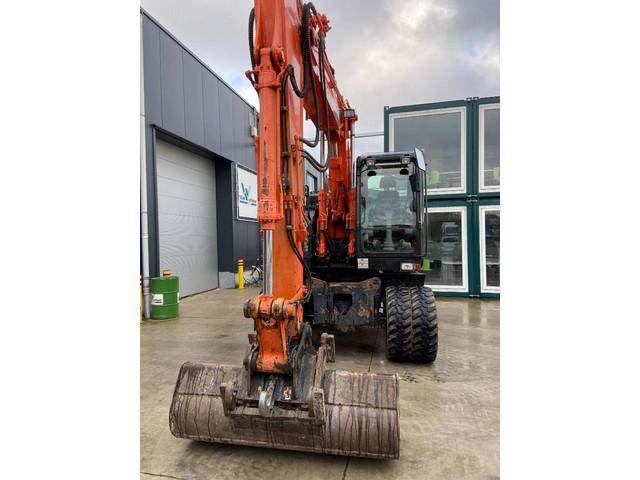 колесный экскаватор HITACHI ZX140W-6