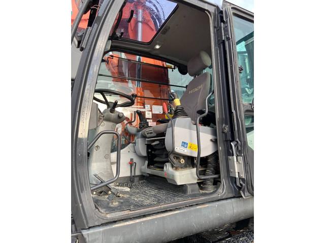 колесный экскаватор HITACHI ZX140W-6