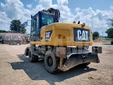 колесный экскаватор CATERPILLAR M313D