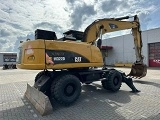 колесный экскаватор CATERPILLAR M322D