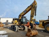 колесный экскаватор CATERPILLAR M318D