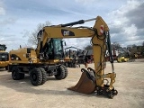 колесный экскаватор CATERPILLAR M318D