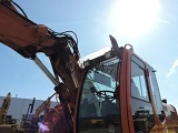 колесный экскаватор HITACHI ZX 140 W 5