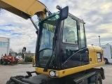 колесный экскаватор CATERPILLAR M318D