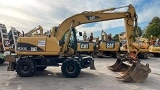 колесный экскаватор CATERPILLAR M 313 C Mono