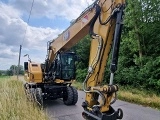 колесный экскаватор CATERPILLAR M316