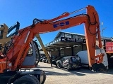 колесный экскаватор HITACHI EX 165 W