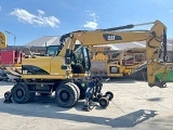 колесный экскаватор CATERPILLAR M316