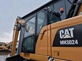 колесный экскаватор CATERPILLAR MH3024