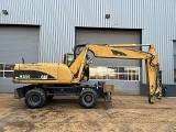 колесный экскаватор CATERPILLAR M322C