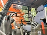 колесный экскаватор HITACHI ZX 130 W