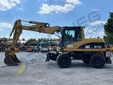 колесный экскаватор CATERPILLAR M 313 C Mono