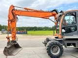 колесный экскаватор DOOSAN DX 140 W