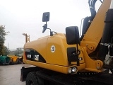 колесный экскаватор CATERPILLAR M322D