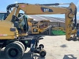 колесный экскаватор CATERPILLAR M316