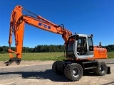 колесный экскаватор HITACHI EX 165 W