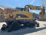 колесный экскаватор CATERPILLAR M316