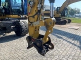 колесный экскаватор CATERPILLAR M318D