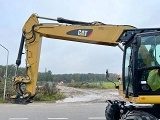 колесный экскаватор CATERPILLAR M320F