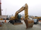 колесный экскаватор CATERPILLAR M322C