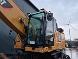 колесный экскаватор CATERPILLAR MH3024