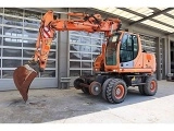 колесный экскаватор New-Holland MH Plus