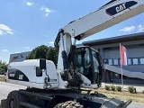 колесный экскаватор CATERPILLAR M322D