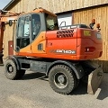 колесный экскаватор DOOSAN DX 140 W