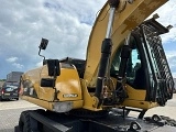 колесный экскаватор CATERPILLAR M322D