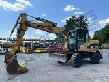 колесный экскаватор CATERPILLAR M 313 C Mono