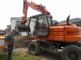 колесный экскаватор HITACHI EX 135 W