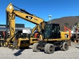 колесный экскаватор CATERPILLAR M318D