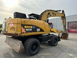 колесный экскаватор CATERPILLAR M322D