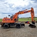 колесный экскаватор HITACHI EX 165 W