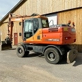 колесный экскаватор DOOSAN DX 140 W