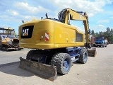 колесный экскаватор CATERPILLAR M320F