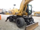 колесный экскаватор CATERPILLAR M322C