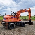 колесный экскаватор HITACHI EX 165 W