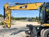 колесный экскаватор CATERPILLAR M316