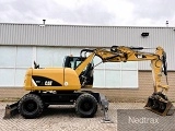 колесный экскаватор CATERPILLAR M313D