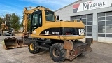 колесный экскаватор CATERPILLAR M 313 C Mono