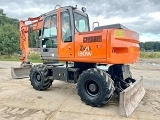 колесный экскаватор HITACHI ZX 130 W