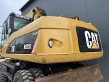 колесный экскаватор CATERPILLAR M322D