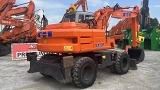 колесный экскаватор HITACHI EX 135 W