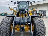 фронтальный погрузчик John-Deere 744 K