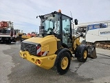 фронтальный погрузчик CATERPILLAR 907H