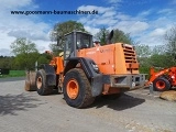 фронтальный погрузчик HITACHI LX 210 E