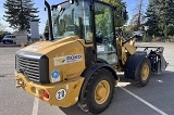 фронтальный погрузчик CATERPILLAR 906M