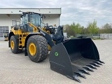 фронтальный погрузчик John-Deere 744 K